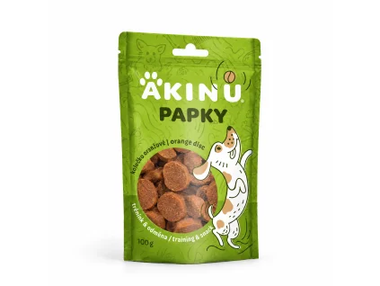 Packshot Akinu PAPKY Kolečko oranžové pamlsek pro psy 100 g (174029) na bílém — natočení sjednocené podle vzoru 174027 (řada Papky).